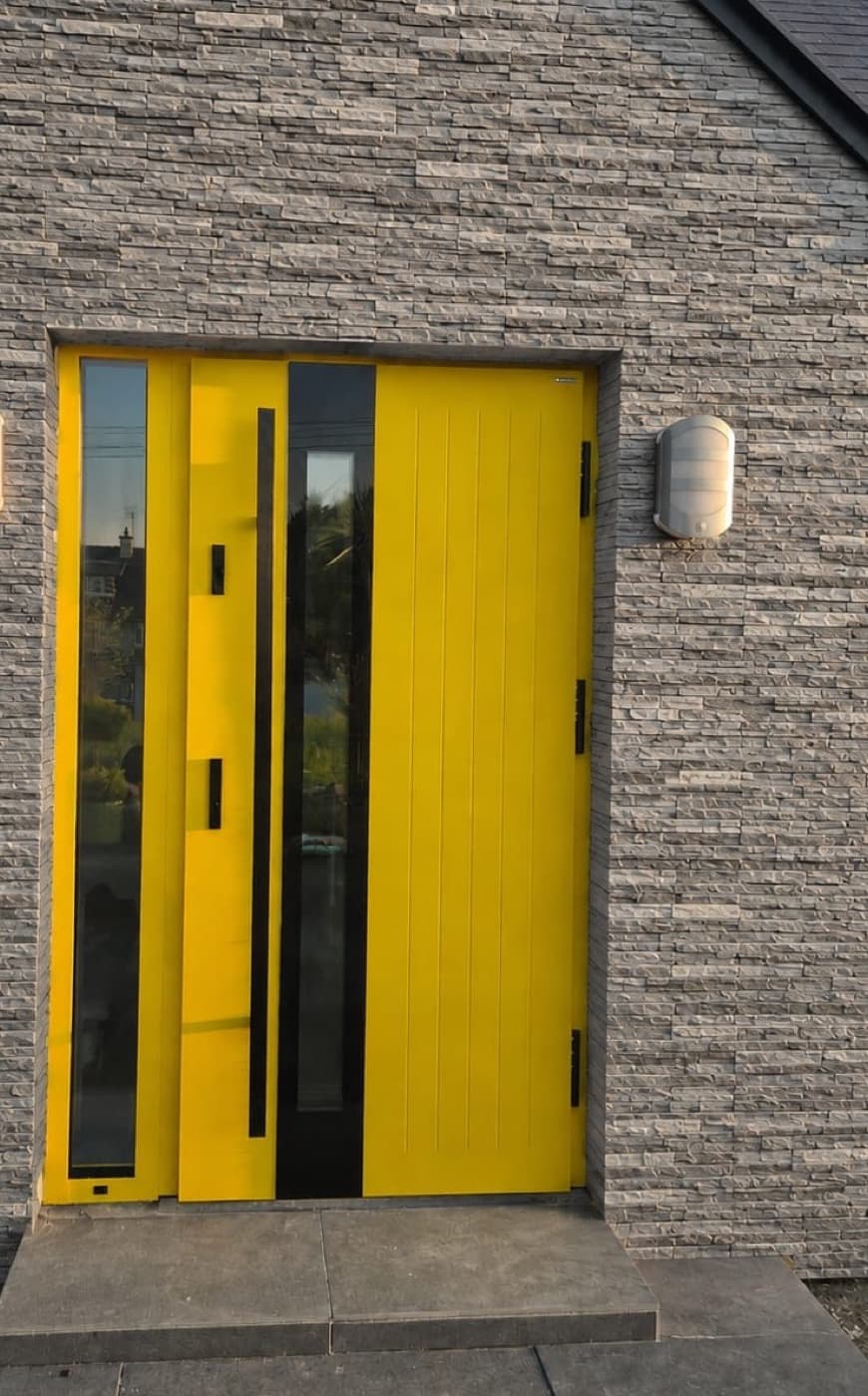 Yellow, long pull handle — front door fitted in Ireland by Kilgate Doors