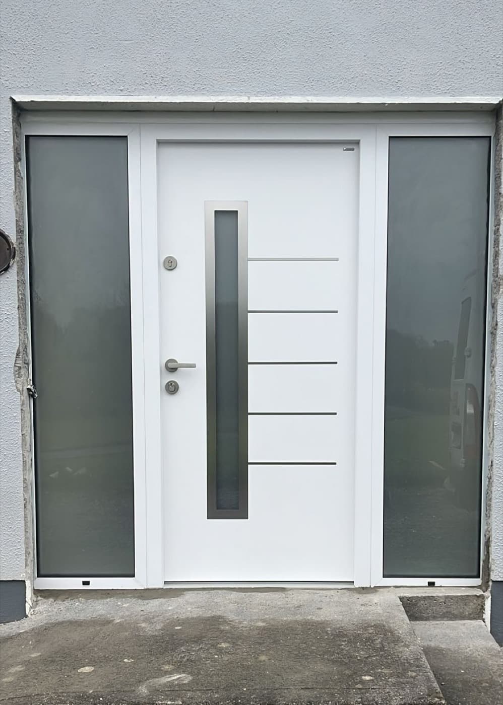 White, two sidelights — front door fitted in Ireland by Kilgate Doors