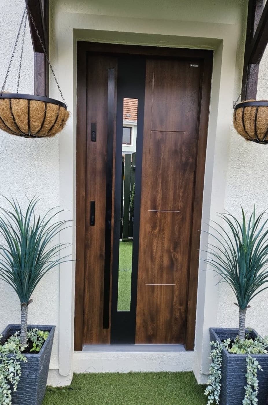 Dark walnut, glazed panel — front door fitted in Ireland by Kilgate Doors