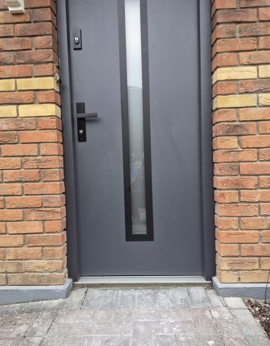 Anthracite, long pull handle — front door fitted in Ireland by Kilgate Doors