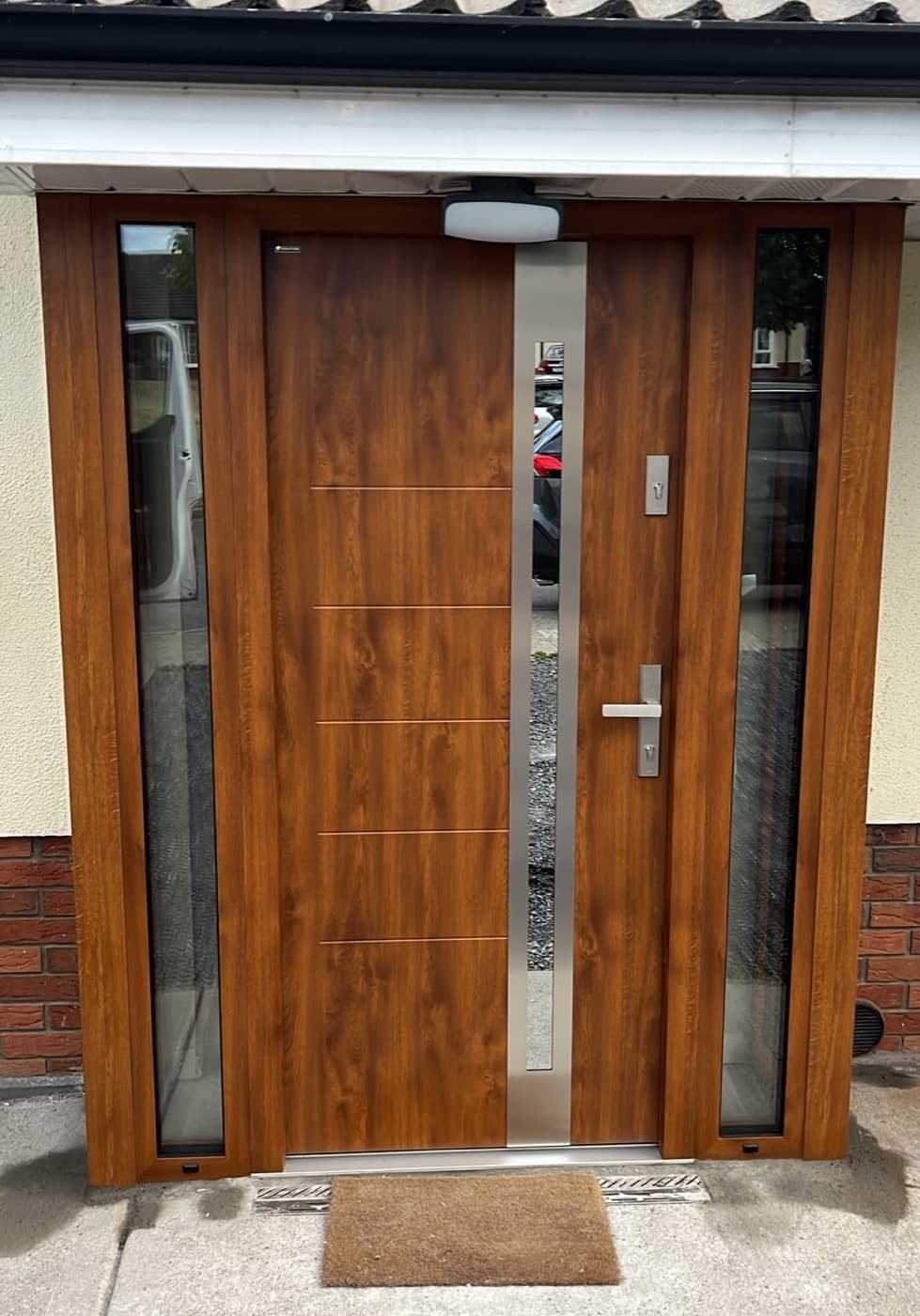 Golden oak, two sidelights — front door fitted in Ireland by Kilgate Doors