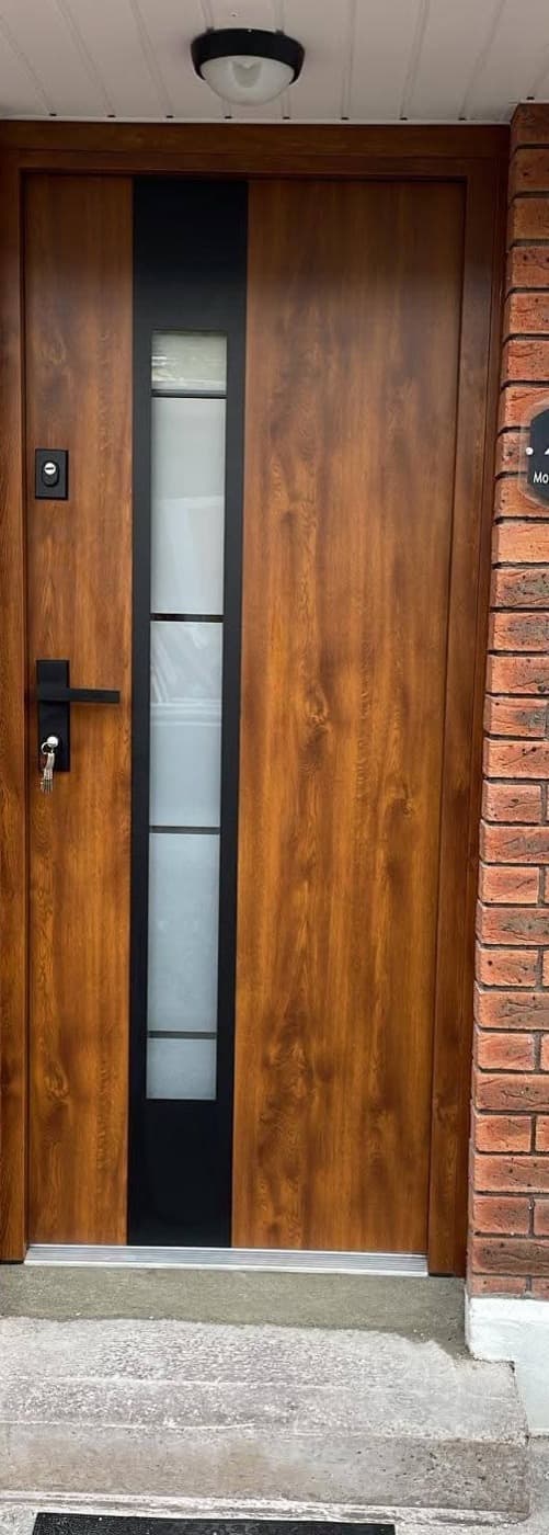 Golden oak, narrow glazing — front door fitted in Ireland by Kilgate Doors