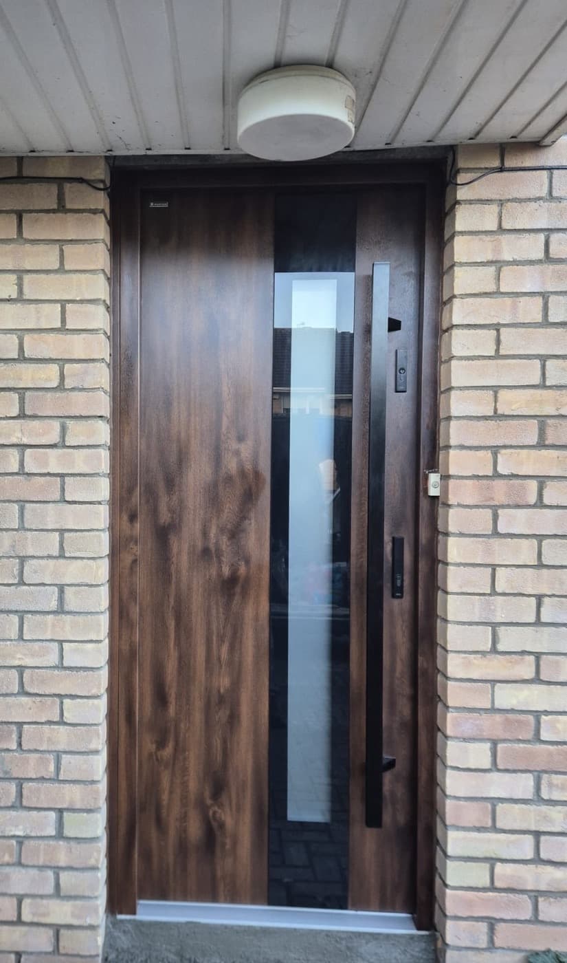 Dark walnut, narrow glazing — front door fitted in Ireland by Kilgate Doors