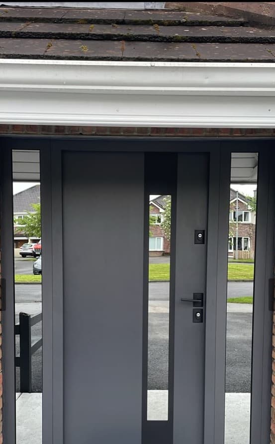 Anthracite, slim glazing and two sidelights — front door fitted in Ireland by Kilgate Doors